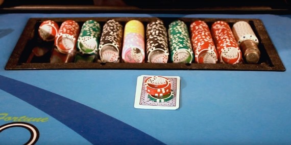 Dealer placing the house wager
