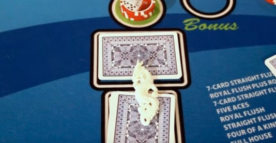 There is a dragon marker on top of the dragon hand cards There is a dragon marker on top of the dragon hand cards