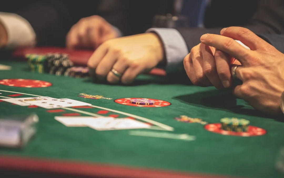 Players gambling at a casino game