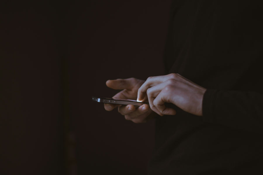 a man is using a mobile phone