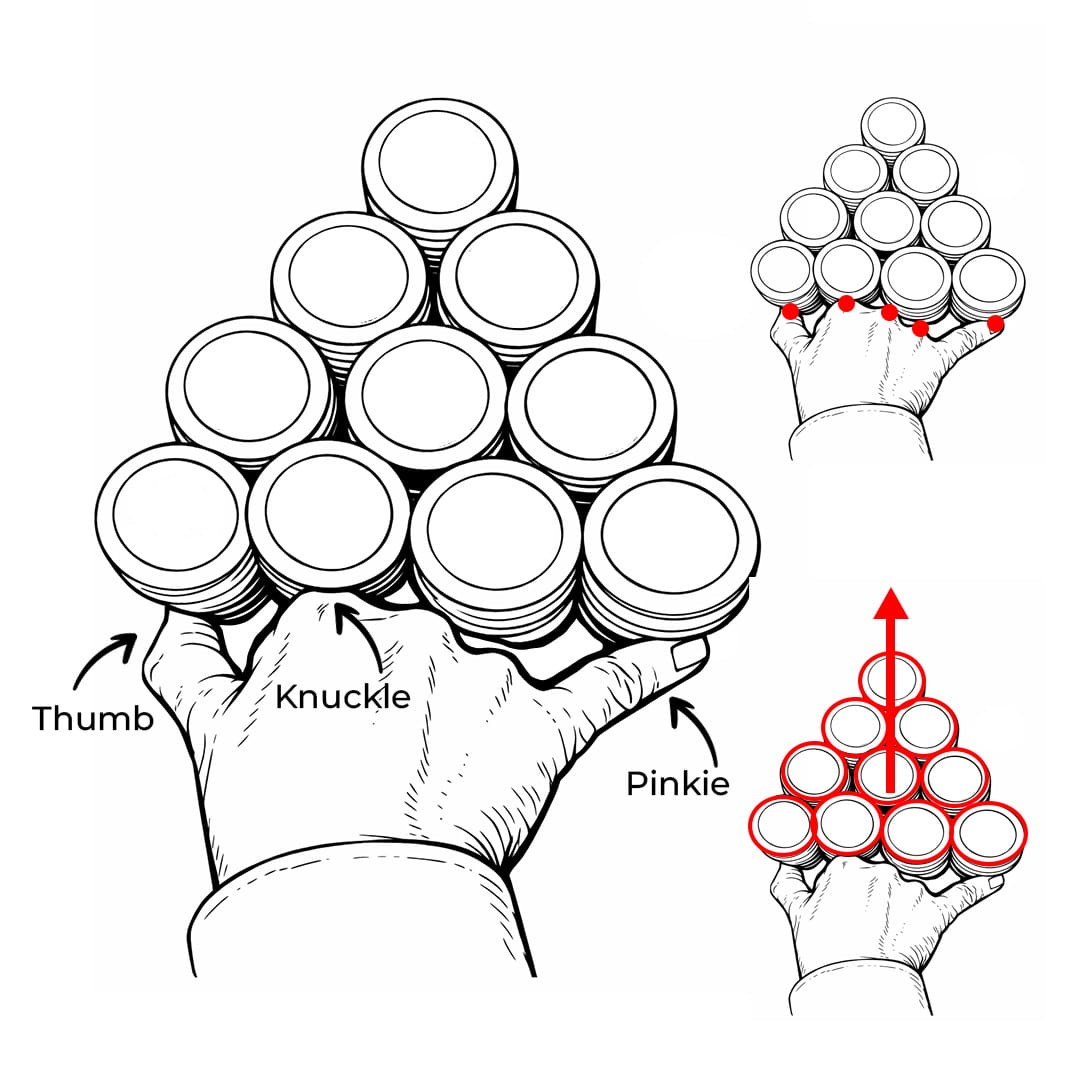 The dealer is pushing 10 stacks of roulette chips with their knuckles