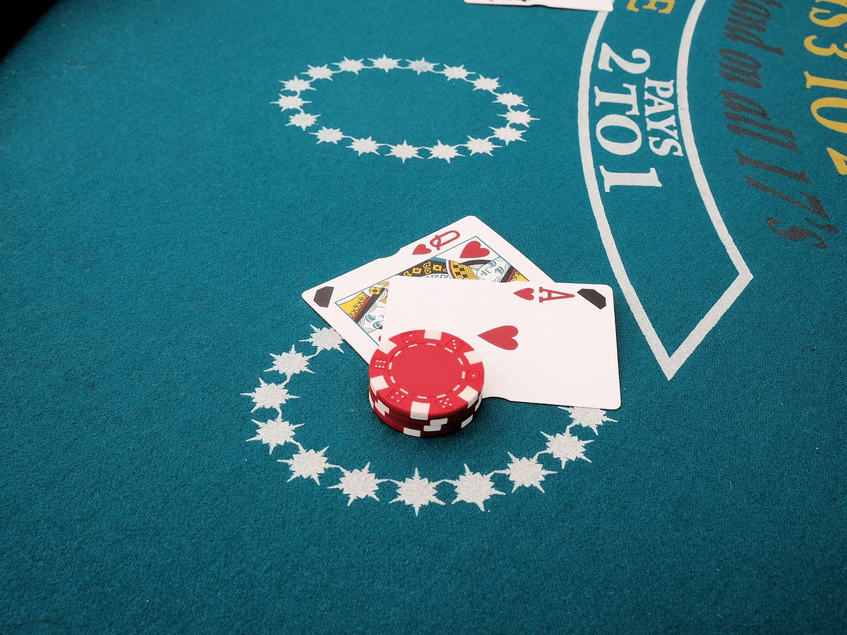 blackjack cards under chips