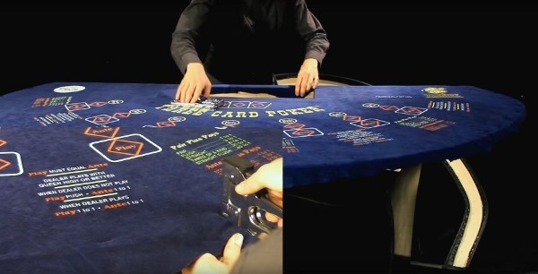 I'm stretching the layout as I staple it to the table I'm stretching the layout as I staple it to the table