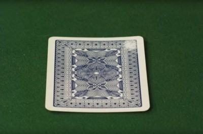The back of a card with a white spot on it The back of a card with a white spot on it