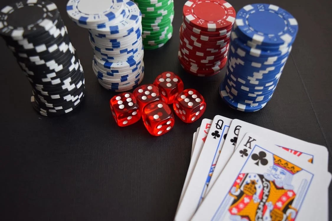 Dice, cards and chips on a table