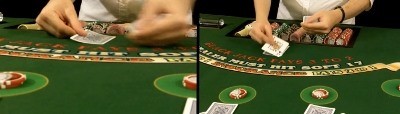 The dealer uses the middle finger to flip the card The dealer uses the middle finger to flip the card
