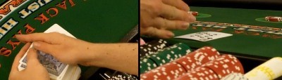The dealer grips the top card The dealer grips the top card