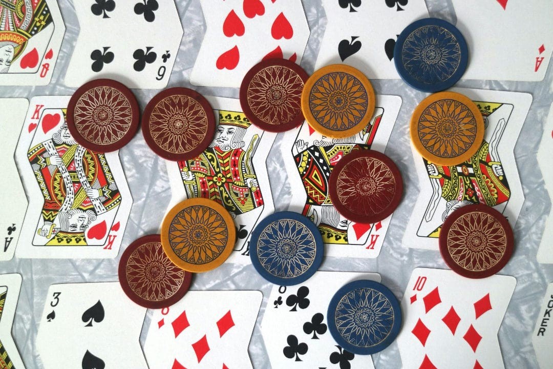Wavy cards with chips randomly spread around