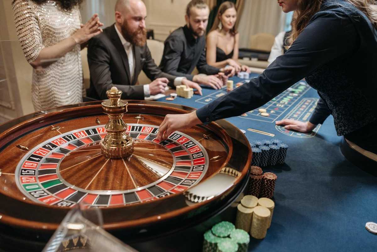a player placing a roulette token