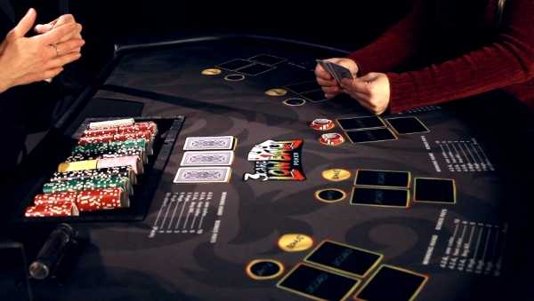 Both the dealer and the player have three cards