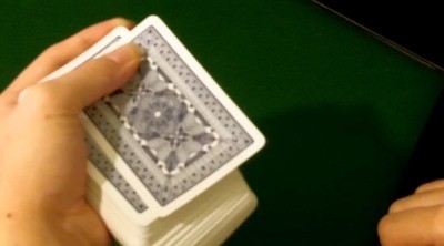 Use your thumb to push the first card out Use your thumb to push the first card out